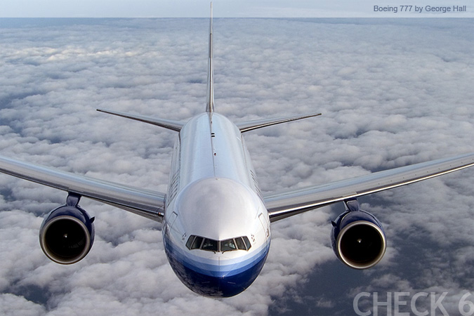 Boeing 777 Air to Air - by George Hall