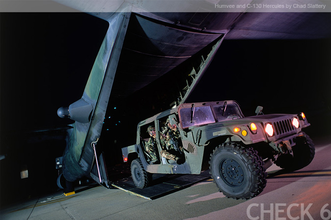 Humvee and C-130 Hercules by Chad Slattery